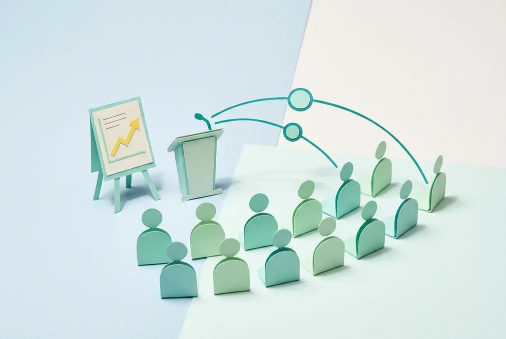 Paper-cutout scene of a speaker's lectern and flip chart sharing a rising-growth playbook with rows of peers